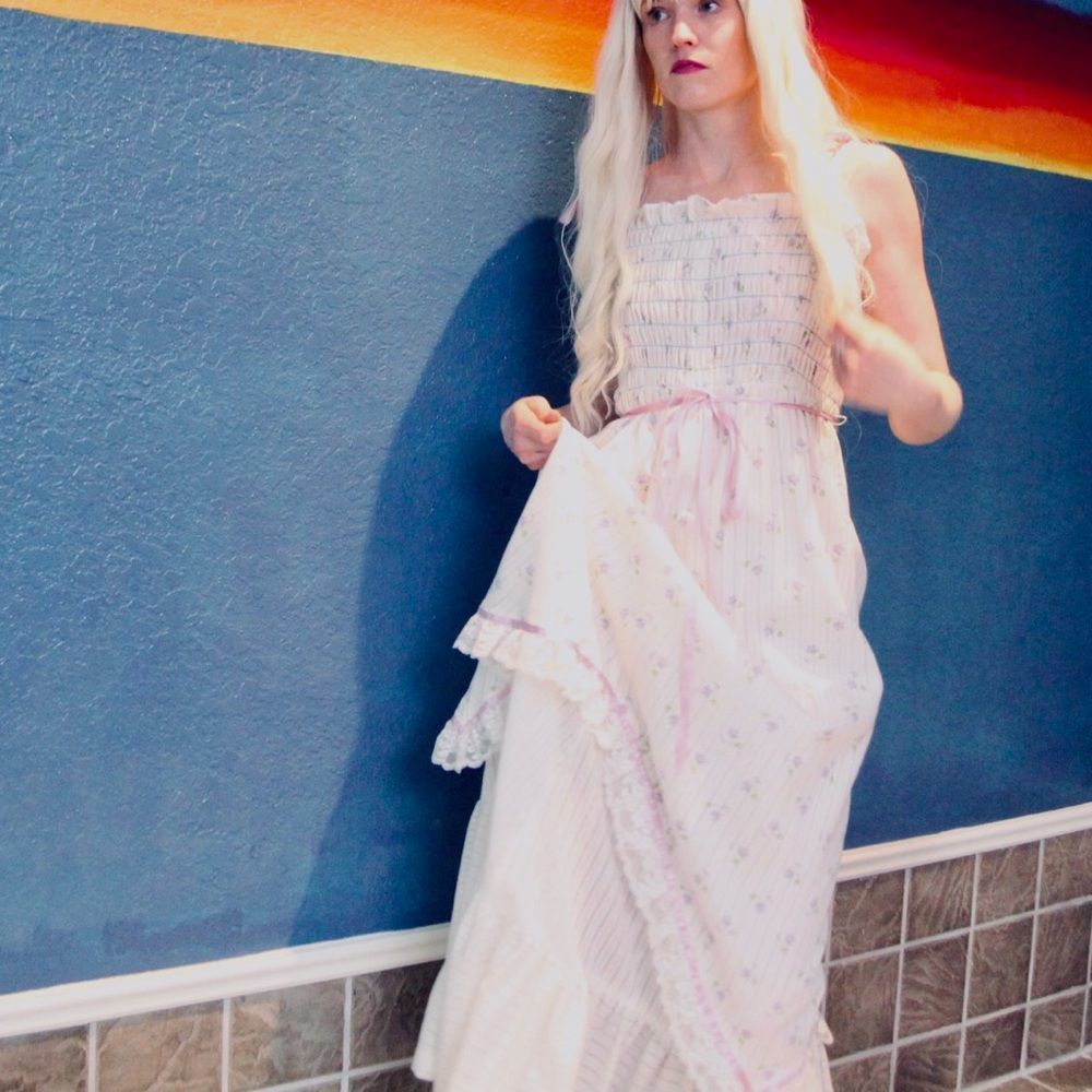 White ethereal angelic dress with tiered layers and ribbon ties